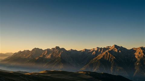 Sunlight hitting mountain